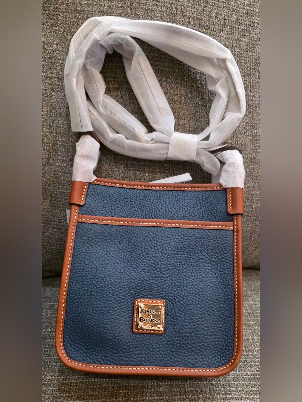 Dooney & Bourke Navy Pebble Grain Letter Carrier